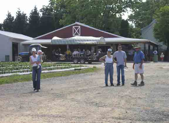 Farmer Ben chats with visitors