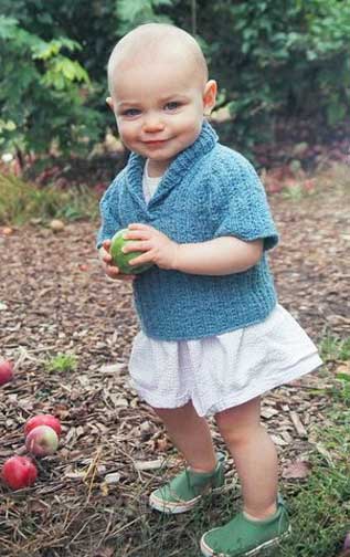 Mary picks her first apple